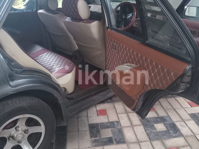 Nissan B11 1985 photo 3