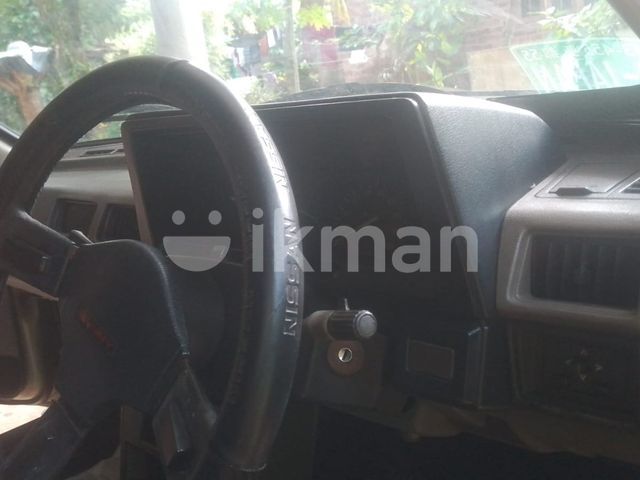 Nissan B11 1987 photo 4