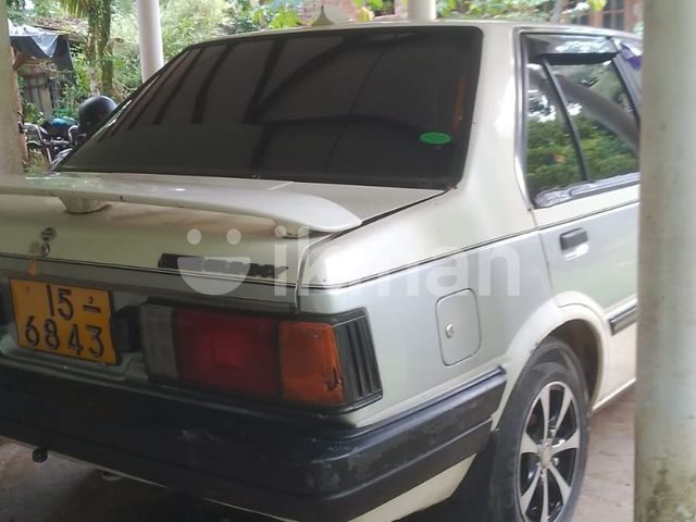 Nissan B11 1987 photo 2