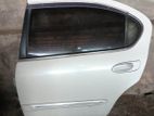 Nissan Cefiro (a33) Complete Lh Rear Door - Reconditioned