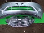 Nissan E12 Front Bumper with Grill
