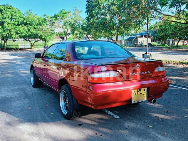 Nissan Presea 1995 photo 2