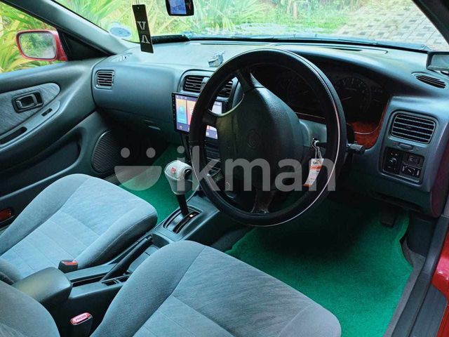 Nissan Presea 1995 photo 4