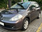 NISSAN TIIDA - RENT A CAR