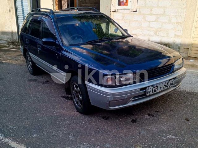Nissan Wingroad 1997 photo 2