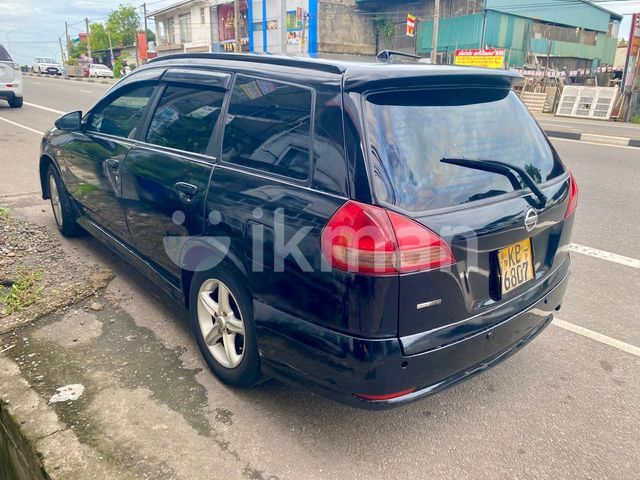 Nissan Wingroad 2003 photo 5