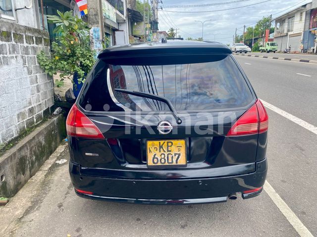 Nissan Wingroad 2003 photo 2