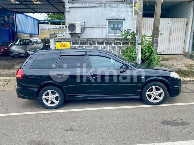 Nissan Wingroad 2003 photo 3