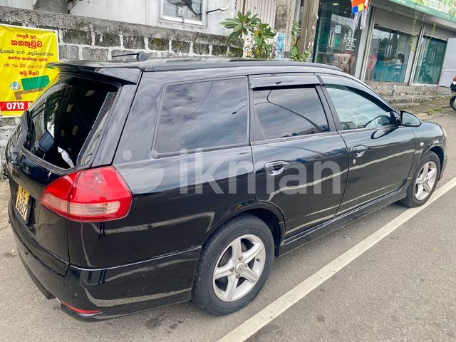 Nissan Wingroad 2003 photo 3