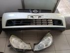 Nissan Y12 Front Bumper With Head light & Grill
