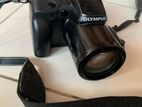 Olympus IS - 1000 Camera + IS/L A-200 H.Q Converter 1.5X Lens