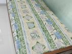 One Used Wooden Bed