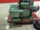 orient baby over lock machine