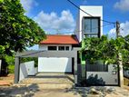 Paddy Field Facing Luxury 3 Storey House for Sale in Homagama