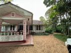 Payagala Land with Colonial House for Sale