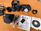 Pentax K5 with 18-55 mm 100mm Macro accessories