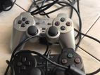 Playstation 2 console with games