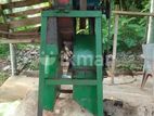 පොල්ලෙලි කපන යන්ත්‍රය