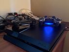 PS4 with 2 Controllers and Game