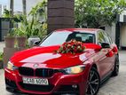 red bmw wedding car