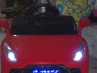 Red Toy Driving Car