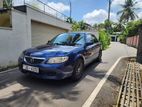 Rent a Car - Mazda Familia BJ5P 2001 (Auto)