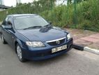 Rent a Car - Mazda Familia BJ5P 2001