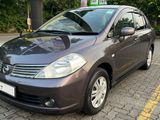 RENT A CAR - NISSAN TIIDA