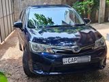 Rent a car - Toyota Axio Hybrid 2015