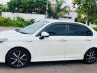 Rent a Car Toyota Axio Hybrid WXB