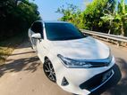 Rent a Car Toyota Axio Hybrid WXB