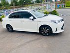 Rent a Car Toyota Axio Hybrid WXB