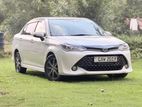Rent a Car Toyota Axio Hybrid WXB