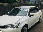 Rent A Car Toyota Axio with half tank fuel