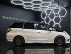 Rent Honda Fit hybrid-fuel efficient, plenty of baggage space