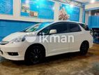 Rent Honda Fit hybrid - TOURMI