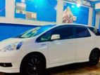 Rent Honda Fit Shuttle hybrid