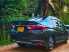 Rent Honda Grace Hybrid Sedan