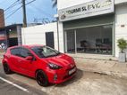 Rent Toyota Aqua -with rental insurance