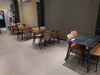 restaurant dining table granite + full cushion chairs