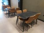restaurants dining table with cushion chairs