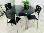 Round Glass-top Dining Table with Chairs