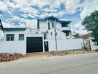 (S444) House for Rent Battaramulla Robert Gunwdhna Rd Facing