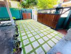 Malaysian Grass and Interlock Paving