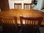 Selling a solid teak wood 6-seater dining table set.