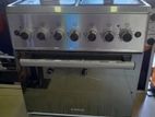 Singer four burner gass cooker with oven