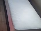 Single bed with 8" thick mattress