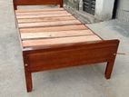 Single polished wooden beds