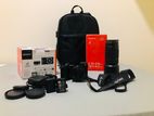 Sony A6000 + kit lens 55mm-210mm sigma 30mm f1.4 DC DN