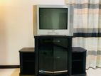 Sony Trinitron TV with stand